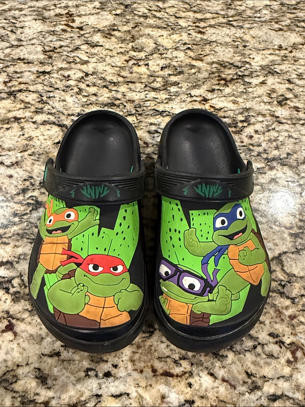 11/12T Kids Black Clog Sandals with Green Turtle Character Graphics GUC